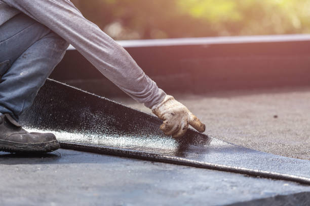 Professional Basement Waterproofing technician working in Pennville, PA